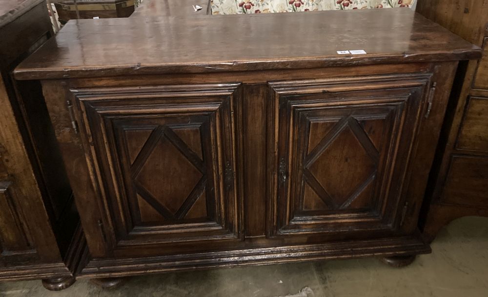 A mid 18th century French provincial oak and elm two door cupboard, with fruitwood top, width 129cm, depth 54cm, height 87cm